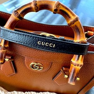 Gucci leather bamboo shapers in black.